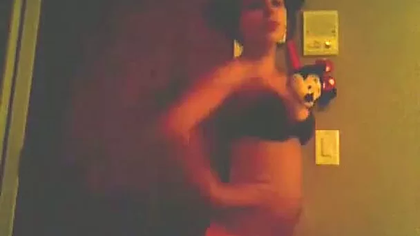 Horny Latina GF strips and pleasures herself in her bed