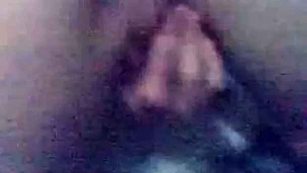 My slim GF entertains herself by fingering her smooth pussy