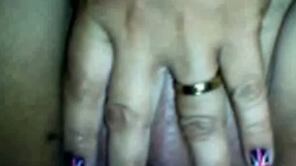Filthy mature whore finger fucks her greasy snatch for me in front of the webcam
