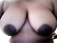 Chubby ebony bitch maturbates her ugly twat in webcam solo clip
