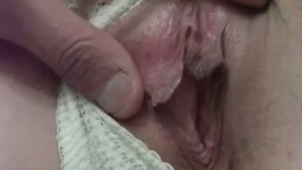 My slim GF allows me to play with her shaved pussy