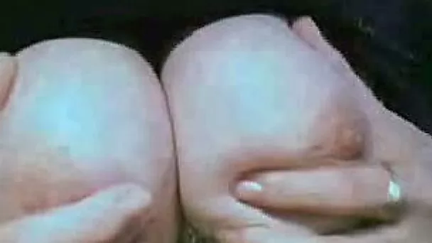 Big and juicy boobies of a mature German mommy on webcam