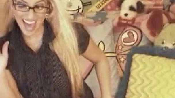 Mature blondie with gigantic tits flaunts them on webcam