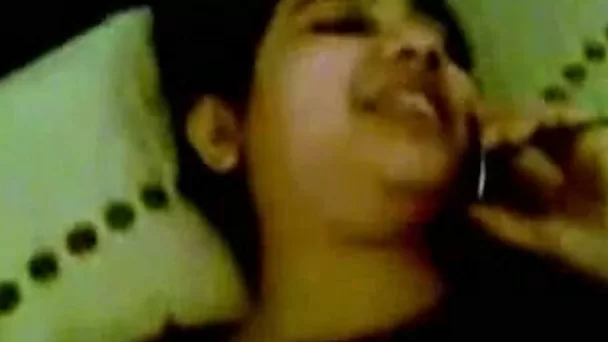 An Indian GF of my cousin talks on phone to her mom as she gets fucked by him