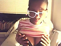 Amateur ebony chick kneads her tits in webcam solo scene