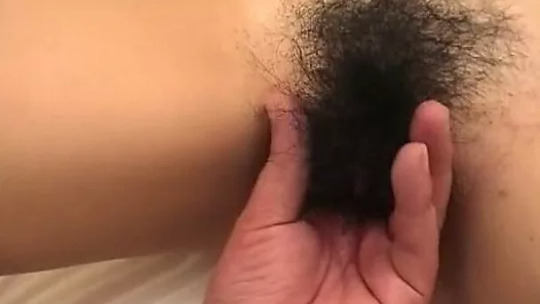 Asian whore sucks a weiner after getting her hairy cunt fingered