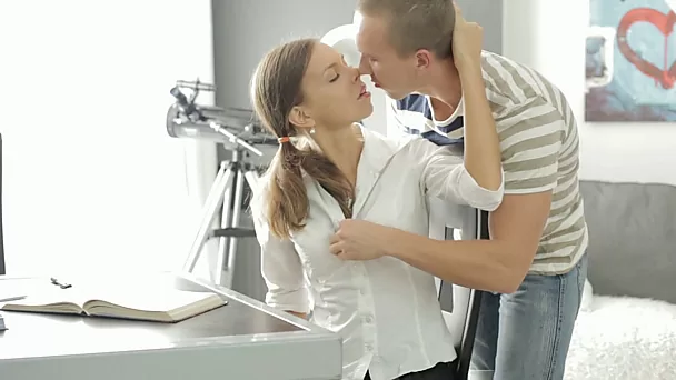 Pigtailed teen makes out with a dude and goes down on him