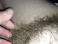 Rubbing my wife's hairy snatch in front of a camera
