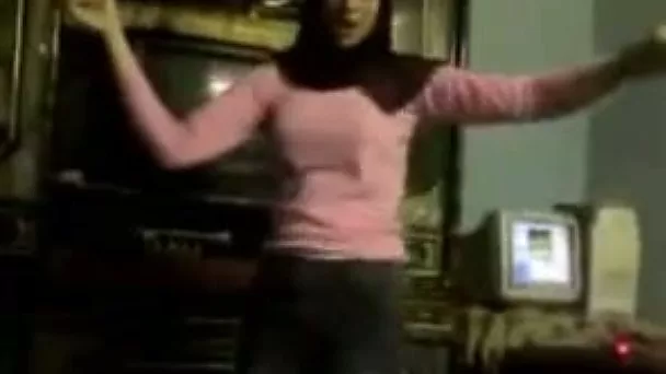 Pretty Arab girl dances in front of a camera in homemade video