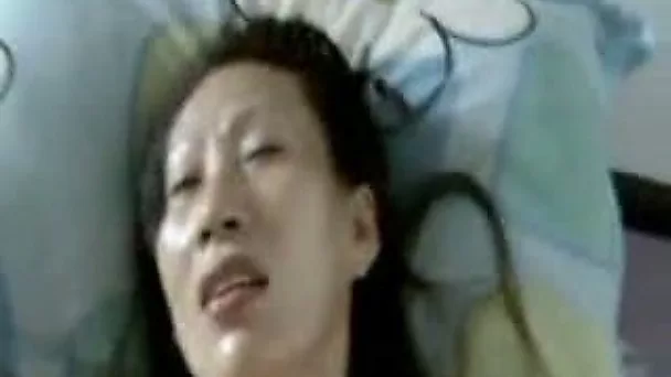 Mature brunette Chinese colleague prefers missionary pose