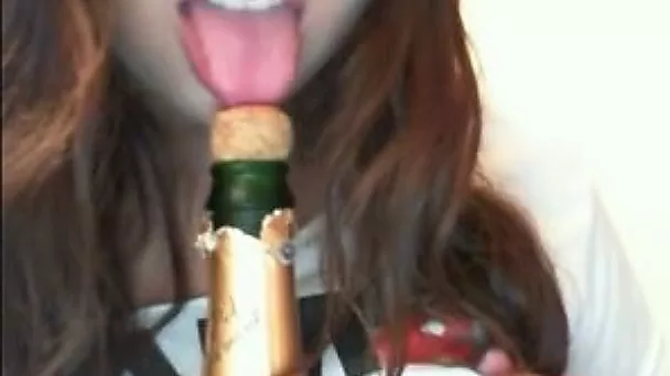 Licking a lollipop and playing with my big natural boobs