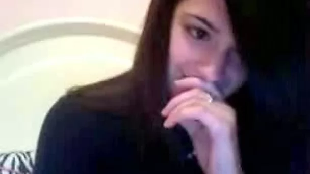 Busty brunette teen licks and kneads her tits in hot webcam solo