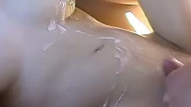 White slut gets a huge cum shot on her belly and on her face