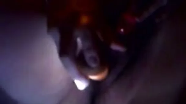 Fat and dirty wife in the dark masturbating with a stick