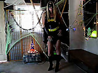 Mature wife in batgirl costume masturbates on Halloween