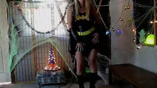 Mature wife in batgirl costume masturbates on Halloween