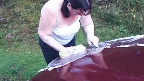 Fat sister of my neighbor washes her car flashing one of her boobs