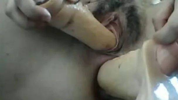 This brunette webcam whore covers her face for safety
