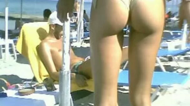 Sweet Greek young babe on the beach with gorgeous booty