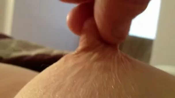 I love squeezing my girlfriend's perky nipples in front of a camera