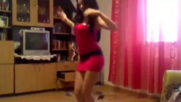 Sizzling college girl dances in front of a cam in her sexy minidress
