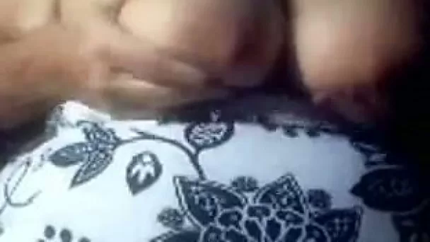 Mature white wife is kneading her saggy boobs like dough