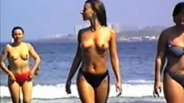 Some of the girls just like enjoying the beach topless