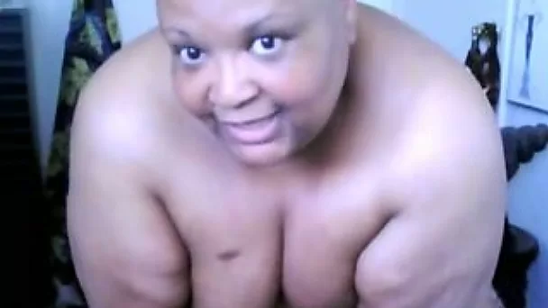 Short-haired ebony fattie uses a dildo to satisfy herself