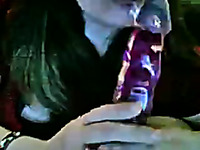 Nerdy amateur webcam slut licks a glossy plastic dildo