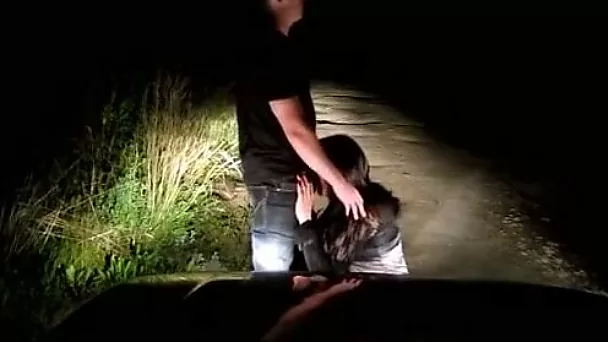 Amateur brunette girl gives head to her BF on the road