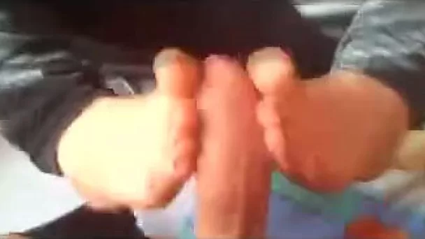 My bodacious and flirty wife knows how to give a footjob