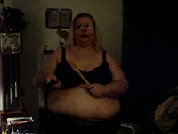 Extremely fat blond granny has fun with ladle and vibrator