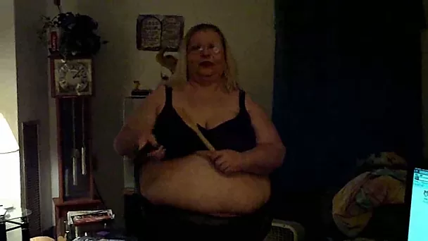 Extremely fat blond granny has fun with ladle and vibrator