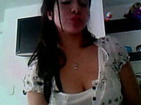 Latina brunette in summer dress gets wild on webcam