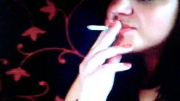 Cute and busty brunette chatting with me and smoking