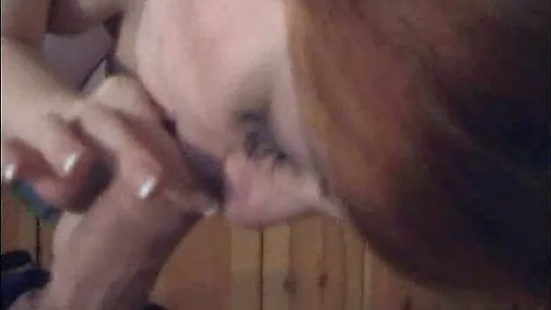 Petite redhead teen with pierced boobies giving head