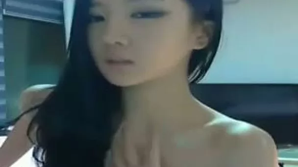 Bewitching Asian cutie knows how to put on a good webcam show