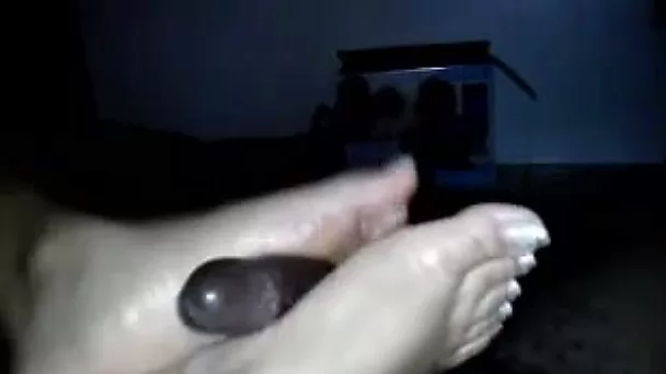 My helpful lover gives me a footjob in interracial homemade clip