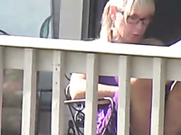 Hidden cam video with a hot blonde milf flashing her panties