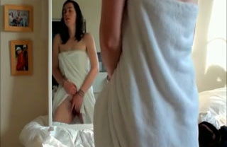 Brunette amateur spied masturbating before the mirror