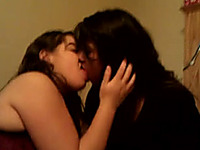 Homemade scene with two chubby lesbians making out