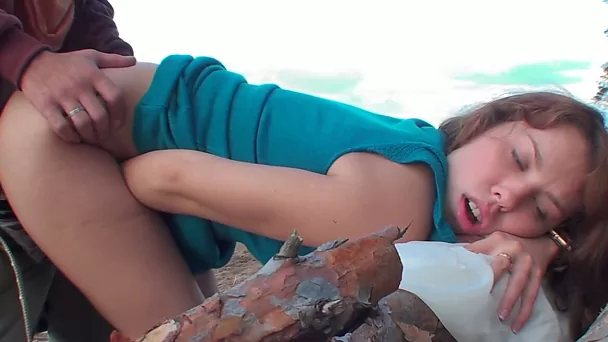Horny Russian redhead fucked hard on the rocks from behind