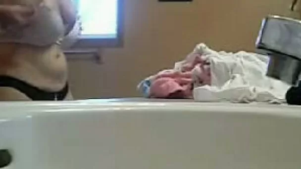 Homemade solo with my busty ex GF dressing up in the bathroom