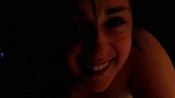 Brunette cutie smiling in the dark and eating my dick