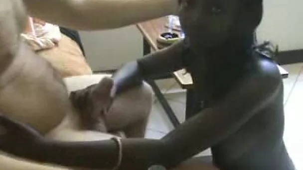 Young black hottie pleasing me with blowjob on the couch