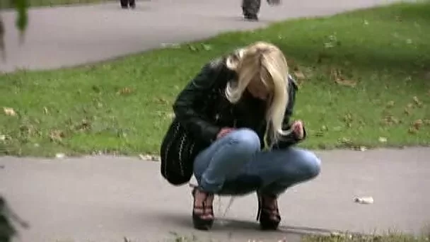 Sweetheart in Russia squats and pisses without taking off her jeans