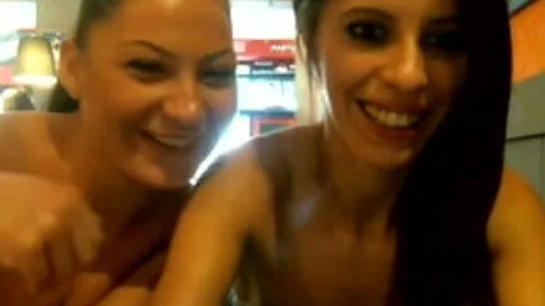 These naughty lesbians in cafe masturbate for me on cam
