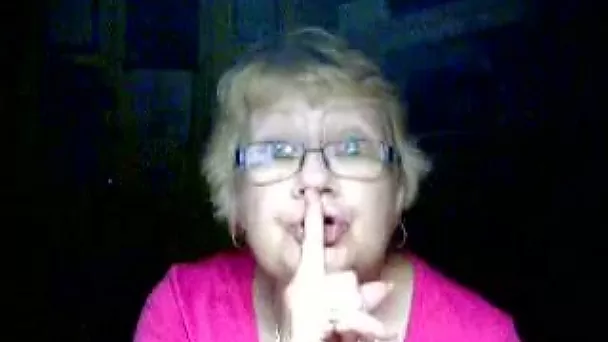 Naughty granny in glasses is showing off her huge tits