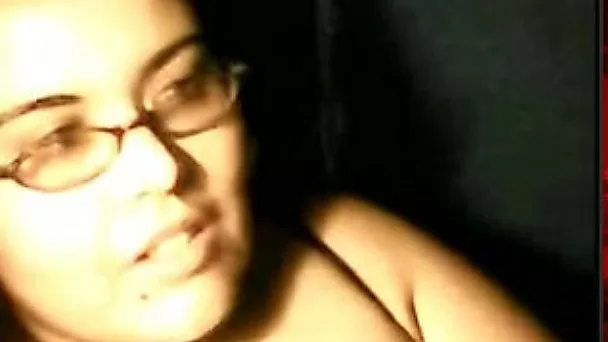 This four eyed bitch loves showing off her big boobs