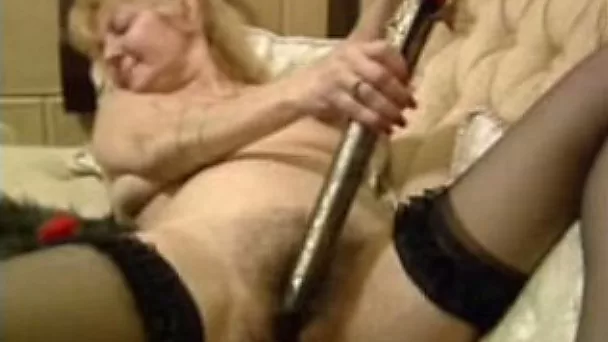 Mature blonde sucks my cock after toying her hairy pussy